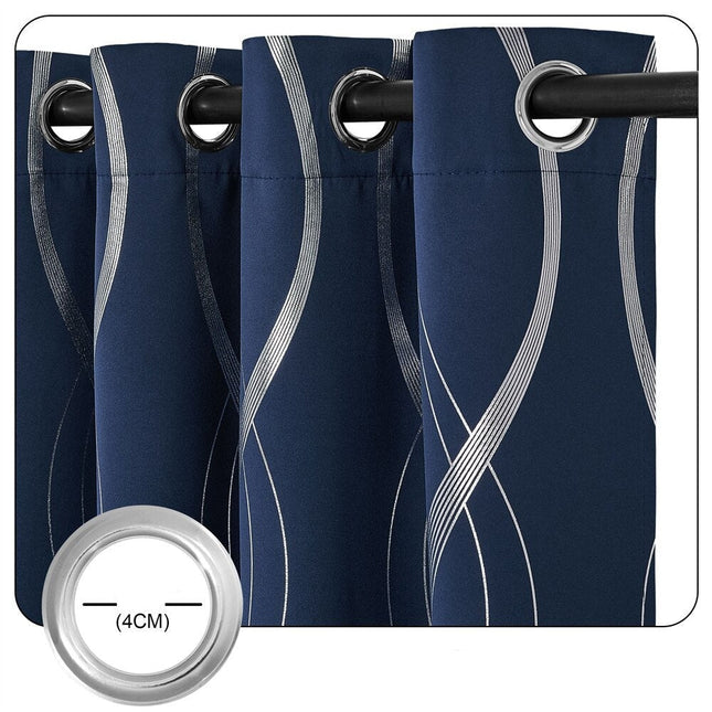 Blå mörkläggningsgardin med vågigt silvermönster