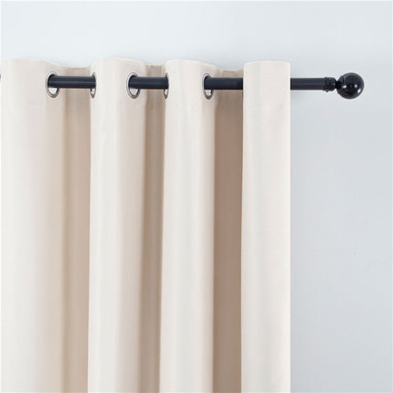 Beige mörkläggningsgardin för sovrum med öljetter