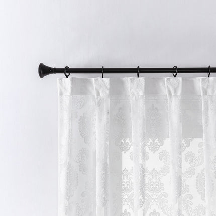Tunn gardin med elegant damastmönster