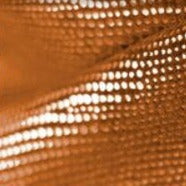 Orange mörkläggningsgardin med struktur