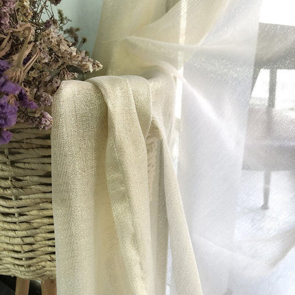 Skimrande tunn gardin i lurex