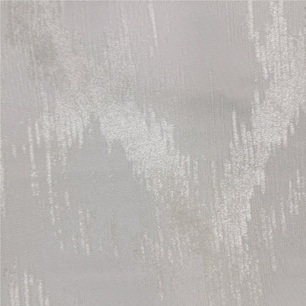 Mörkläggningsgardin gråbrun med abstrakt mönster