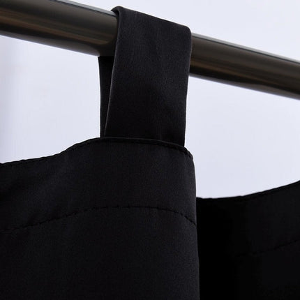 Mörkläggningsgardin med hällor för total mörkläggning