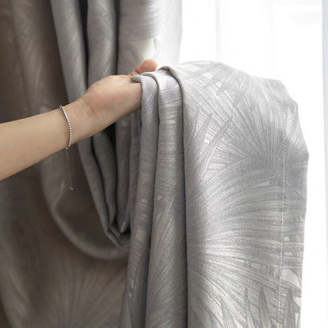 Mörkläggningsgardin Seki med diskret palmbladsmönster