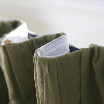 Dubbellagers gardin med mörkläggning och voile