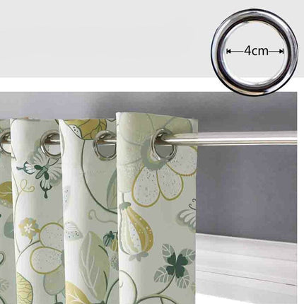 Mörkblå gardin med färggrant blommönster