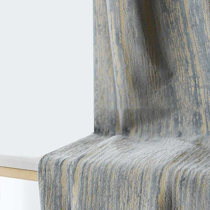 Texturerad mörkläggningsgardin med vågmotiv