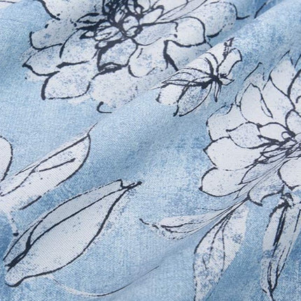 Mörkläggningsgardin med vackert blommönster.