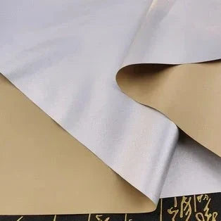 Svart mörkläggningstyg med silverbaksida