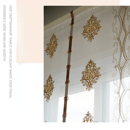 Tunn hissgardin med broderat mönster