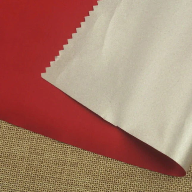 Svart mörkläggningstyg med silverbaksida