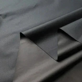 Svart mörkläggningstyg med silverbaksida