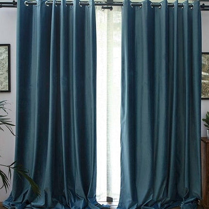 Skimrande blå mörkläggningsgardin med öljetter