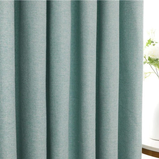 Ljusdämpande turkos gardin för vardagsrum