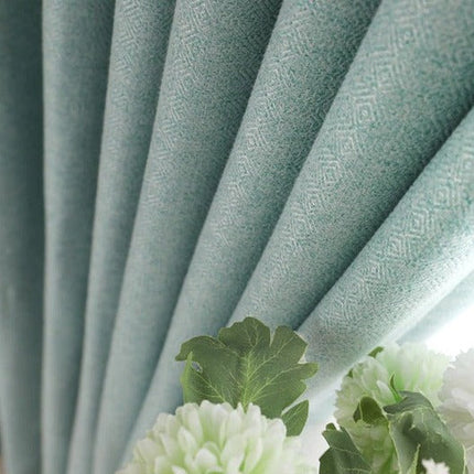 Ljusdämpande turkos gardin för vardagsrum