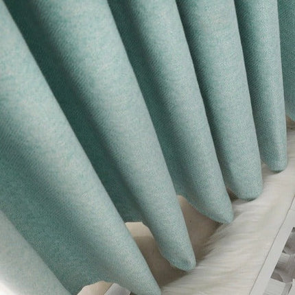 Ljusdämpande turkos gardin för vardagsrum