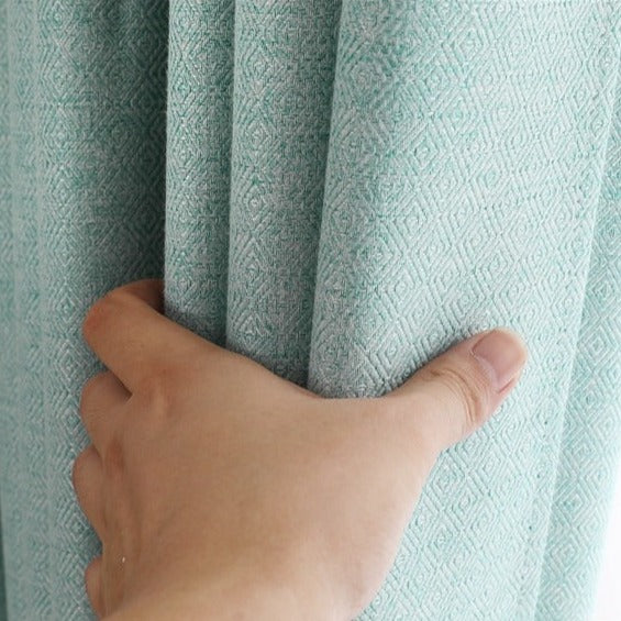 Ljusdämpande turkos gardin för vardagsrum