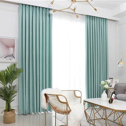 Ljusdämpande turkos gardin för vardagsrum