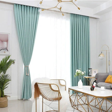 Ljusdämpande turkos gardin för vardagsrum
