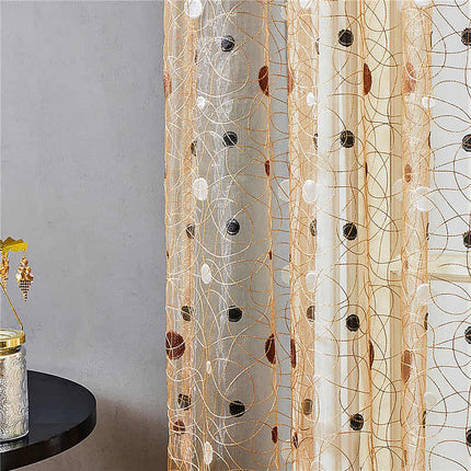 Vit mönstrad voilegardin för sovrum