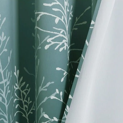 Grön altangardin med gradientmönster