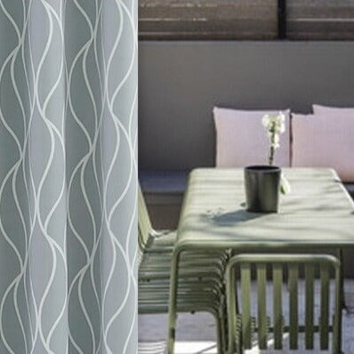 Mönstrad utomhusgardin med vågor