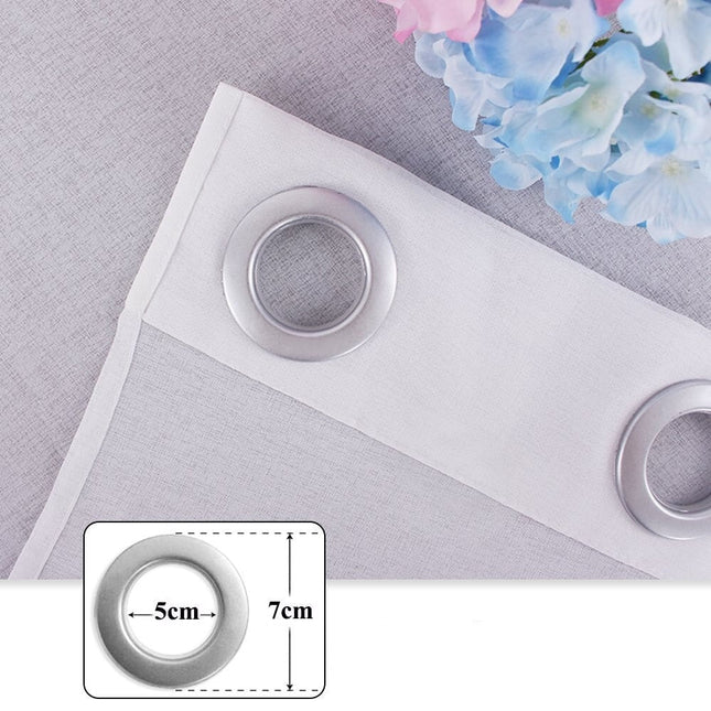 Ljusgrå utomhusgardin i skir linnestruktur